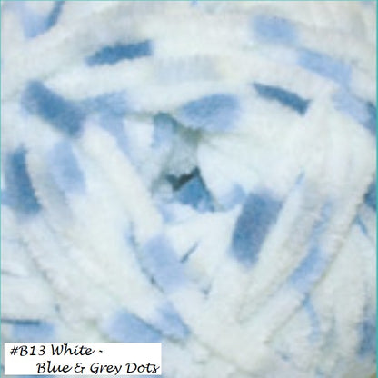 Flutterby Chunky Yarn from James C Brett. Color #B13 White with light and dark blue and grey dots