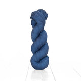 Urth Yarn's tonal fingering yarn in a rich indigo blue