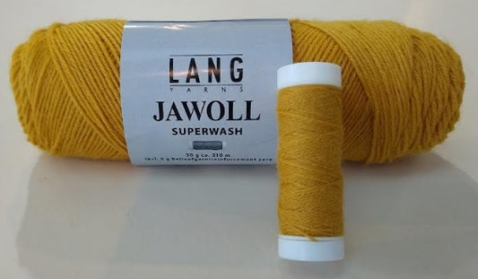 Jawoll Sock Yarn with reinforcement yarn spool.